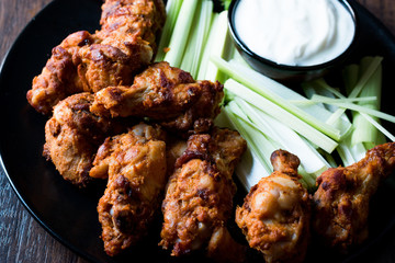 Buffalo Wings with Dip Sauce and Leek