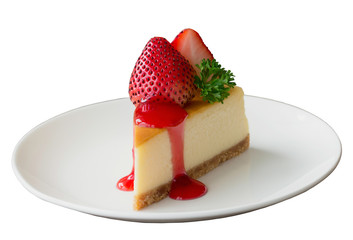 White isolated background with clipping paths homemade New York cheesecake on white plate decorated strawberry,parsley and strawberry sauce. Delicious moist and smooth baked strawberry cheesecake.