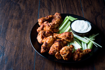 Buffalo Wings with Dip Sauce and Leek