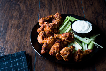 Buffalo Wings with Dip Sauce and Leek