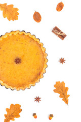 Festive homemade pumpkin pie on white background. Flat lay, top view. Thanksgiving Day