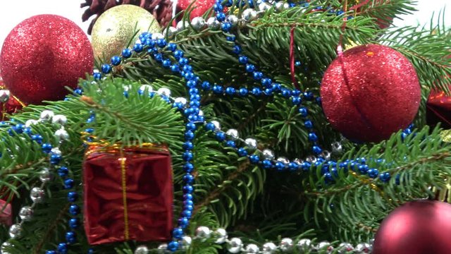 Close up of christmas balls on a fir tree branch