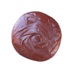 melted dark chocolate isolated on white
