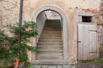 castle door with stairs