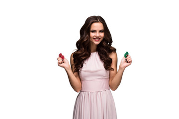 Sexy curly hair brunette posing with chips in her hands, poker concept isolation on white background