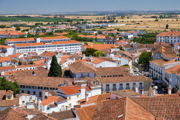 Fototapeta na wymiar The view of city residential houses which surround the Cathedral (Se) of Evora. Portugal