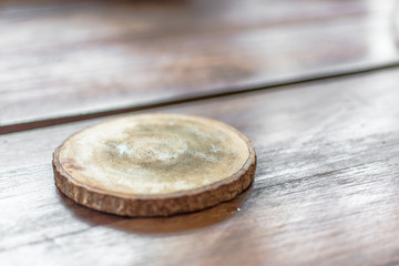 Wooden beer or coffee  coasters on the wood table background.