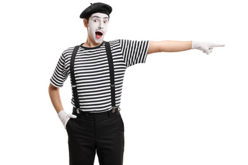 Mime artist pointing