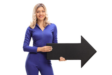 Young woman in a racing suit holding an arrow © Ljupco Smokovski