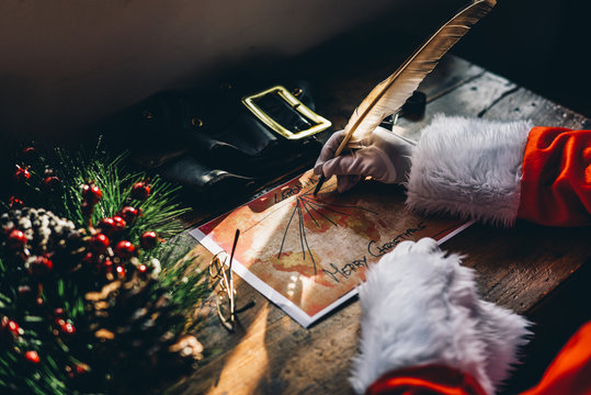 Santa Claus making gifts for Christmas