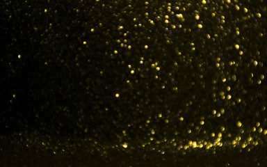 Gold glitter texture bokeh background