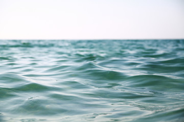Sea  waves background.Pure light blue and green water.