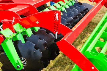 Detailed closeup of disc harrow agricultural machinery