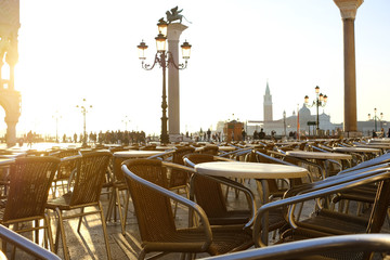 Street cafe at sunny morning in Venice