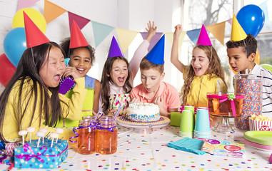 group of children at birthday party at home