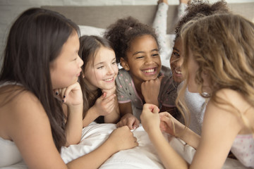Obraz premium large group of her friends taking goog time on bed