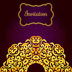 Rich gold invitation card in the Indian style. 