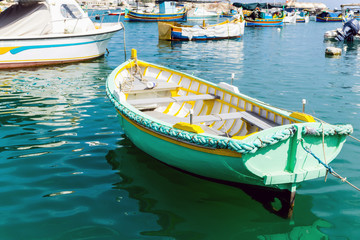 Traditional boats at Marsaxlokk Harbor in Malta