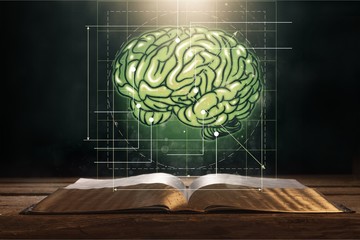 Open book on old wooden table.