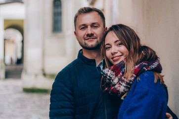 Young Couple hugs outside