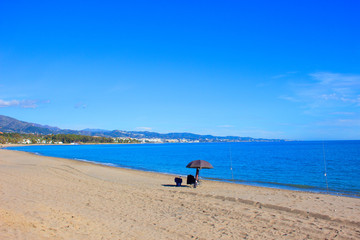 Fishing. Beautiful Spanish beach. Costa del Sol, Andalusia, Spain.
