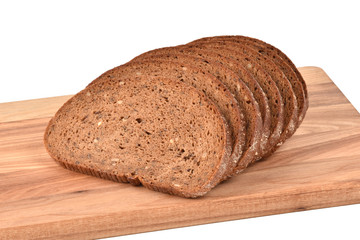 Sliced bread on a cutting board. Isolated rye bread.