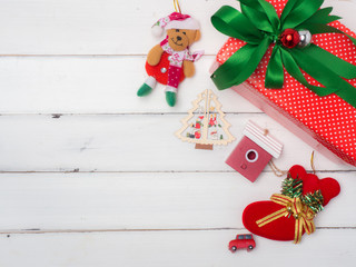 Christmas decoration  on white wood background . Red and gift box and decoration object  .top  view composition.