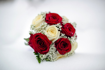     Wedding bouquet on the snow 
