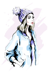 Beautiful young woman in knitted Hat with Fur Pom-Pom. Hand drawn stylish woman portrait. Fashion lady. Winter outfit. Sketch.