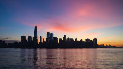 Naklejka premium New York at sunrise from Jersey City