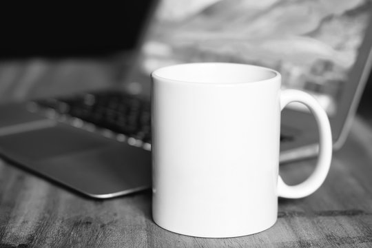 White mug on the desktop
