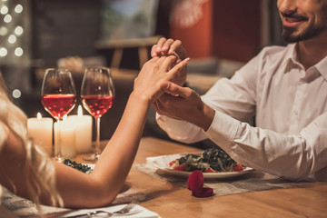 Man proposing in restaurant