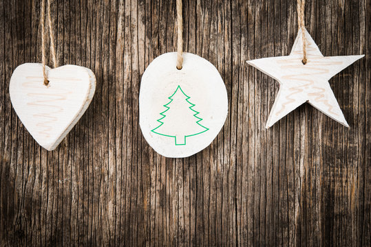 Christmas decorations over rustic wooden background