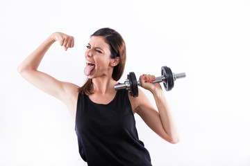 Fototapeta na wymiar Young woman showing muscles