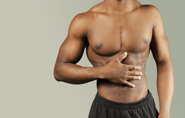 Fototapeta premium Close-up photo of afro american musculary young man