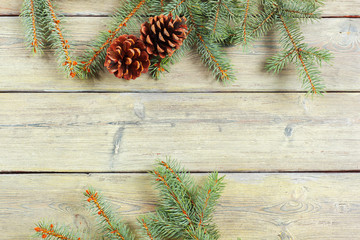 White wooden table with christmas tree and decorations top view.