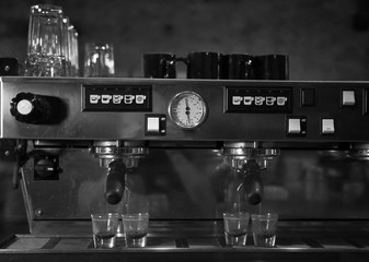 Fototapeta na wymiar Espresso Machine Working in a Cafe