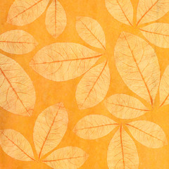 Orange artistic background with leaves drawn in hand-pencil