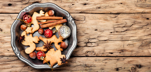 Christmas cookie on retro wooden background