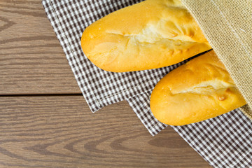 French  baguettes with sack on napery