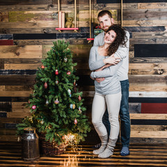 Happy smiling family near the Christmas tree. Christmas and New Year concept