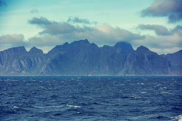 Fototapeta na wymiar View of mountain seashore. Beautiful nature Norway. Lofoten islands
