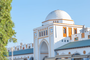 Nea Agora Building in Greek town Rhodes with blue clean sky