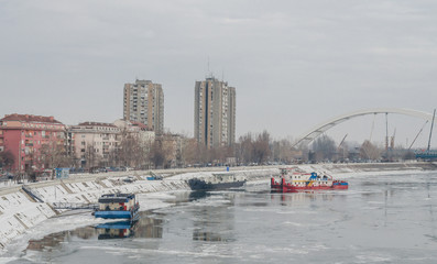 Obraz premium Icebreaker on the frozen Danube River 