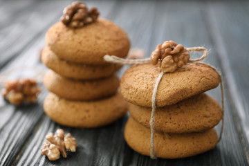 Tasty oatmeal cookies on table, closeup