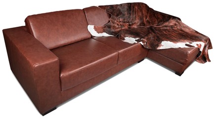 Brown Leather corner Sofa with Furry Blanket - Isolated