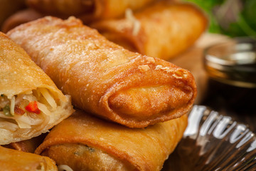 Spring rolls with chicken and vegetables served with sweet chili sauce or soy sauce