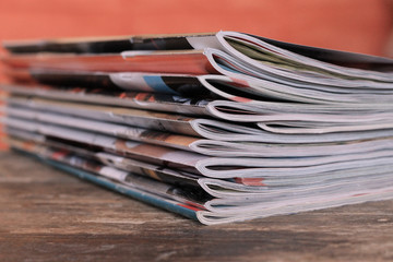 Magazines on the wooden table