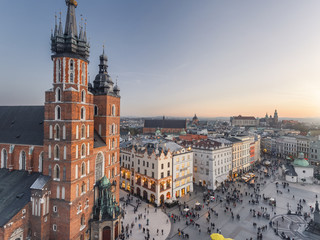 Aerial view of old city center view in Krakow at sunset time, main square, famous cathedral in...