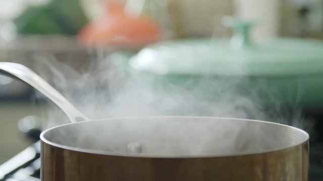 Closeup Of Steam Emitting From Container In Kitchen